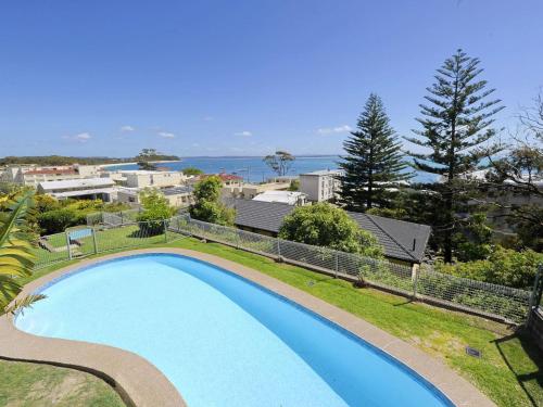 an overhead view of a swimming pool in a yard at Sundeck Unit 9 51 Ronald Avenue in Shoal Bay