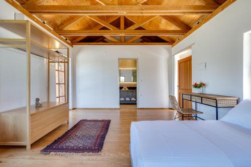 Postel nebo postele na pokoji v ubytování Armonia Retreat