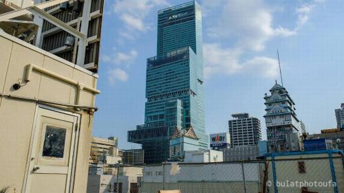 a group of tall buildings in a city at City view guesthouse Private room - Vacation STAY 85052 in Osaka
