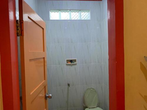 Koupelna v ubytování OYO 90770 Wisma Rima Melati