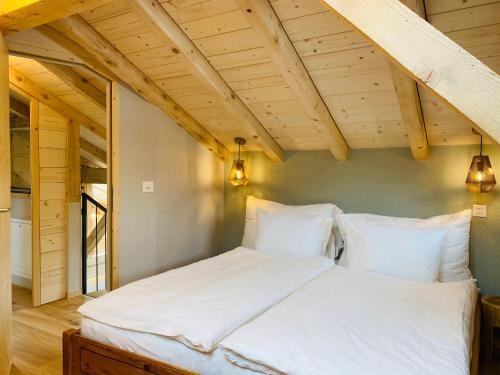 Postel nebo postele na pokoji v ubytování Chalet Bergheimat Zermatt