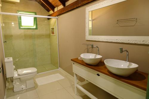 Ванная комната в Chalés Pomerode