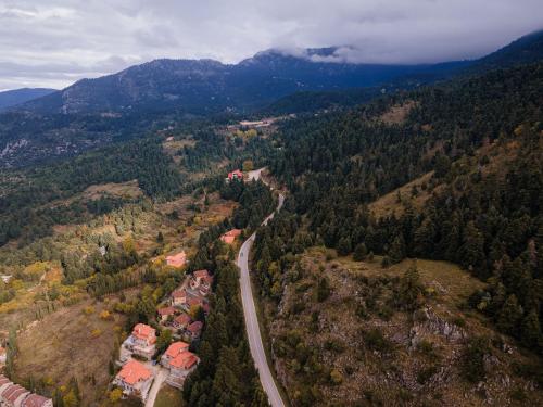 an aerial view of a road in the mountains at Parnassus Dreamwood Chalet in Eptalofos