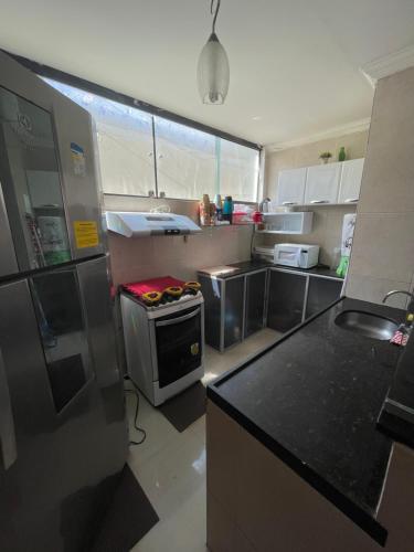 Kuchyň nebo kuchyňský kout v ubytování Flat Residence Maragogi