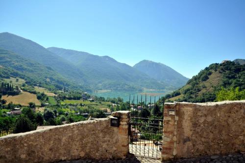 a view of a valley with mountains in the background at CASA CON TERRAZZI - 6posti 2stanze 2bagni - LAKEHOLIDAY IT in Castel di Tora