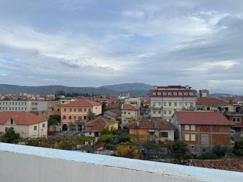 a view of a city with houses and buildings at Eagle’s Nest in Shkodër
