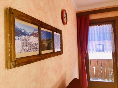 TV tai viihdekeskus majoituspaikassa DGApartments Stella Alpina Livigno