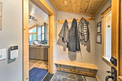 a hallway of a tiny house with wooden ceilings at Luxe Truckee Cabin with Golf Course View and Deck in Truckee