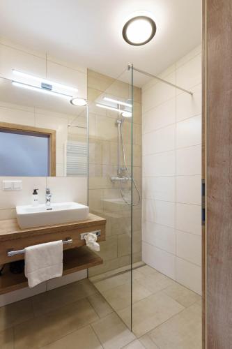 Ein Badezimmer in der Unterkunft Stoagas Waidblick