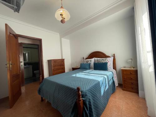 เตียงในห้องที่ Moradia da Ilda - Casas de Férias Nazaré