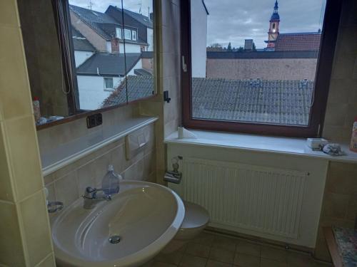 Bathroom sa Zentrale Ferienwohnung mit Blick auf die Paulinskirche