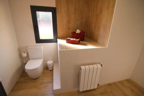 Vonios kambarys apgyvendinimo įstaigoje Casa TAPIOLAS