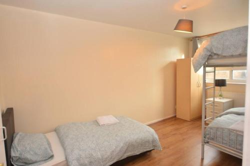 A bunk bed or bunk beds in a room at Spacious 2Bedroom condo with Patio by Excel Centre