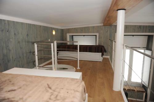 a bedroom with two bunk beds in a room at THE BOAT Apartamento Temático in Seixal