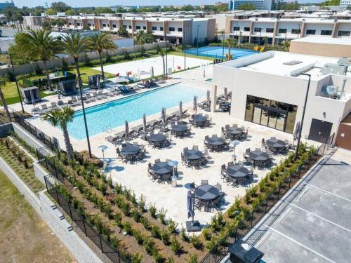 an aerial view of the pool at a resort at Beautiful Magic Village 4 Suites near Disney 7493 in Orlando