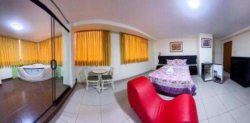 TV a/nebo společenská místnost v ubytování Hostal El Click