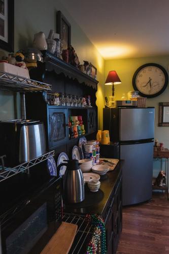 Køkken eller tekøkken på Chez Palmiers B&B