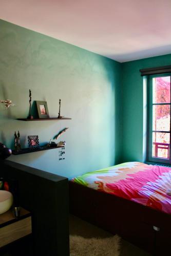 Katil atau katil-katil dalam bilik di Le repaire, agréable logement, vue imprenable