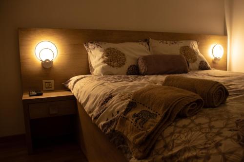 Ένα ή περισσότερα κρεβάτια σε δωμάτιο στο Zlatibor MM Apartmani