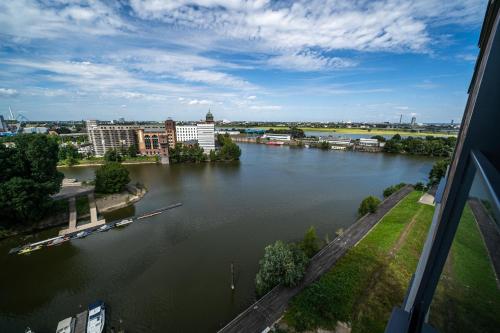 a view of a river from a building at Luxury Apartments Düsseldorf in Düsseldorf