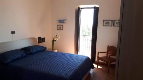 Ένα ή περισσότερα κρεβάτια σε δωμάτιο στο Appartamento Miralago Bolsena (14934 Lazio)