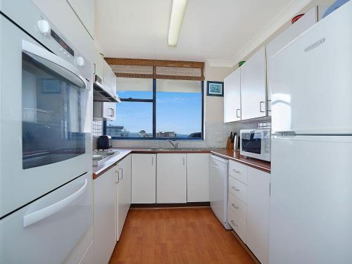 A kitchen or kitchenette at St Tropez Unit 39 - The Entrance, NSW