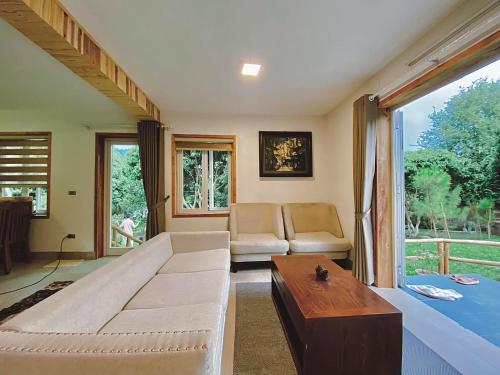 Posezení v ubytování Biệt Thự Con Công Mini Sóc Sơn Venuestay