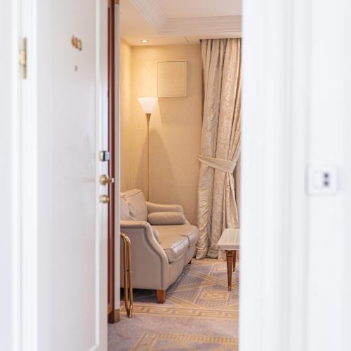 Una cama o camas en una habitación de Atli Hotel Ankara