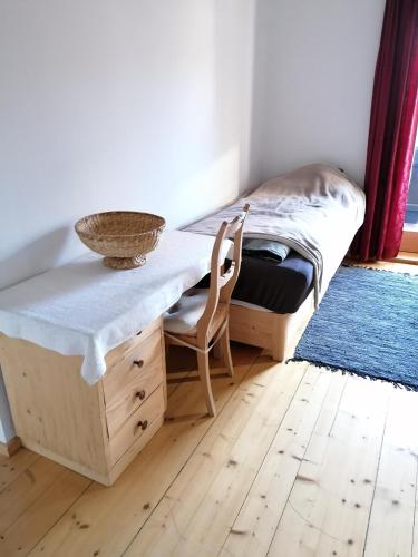 Postel nebo postele na pokoji v ubytování Ferienwohnung "Josefine und Ihr Kavalier"