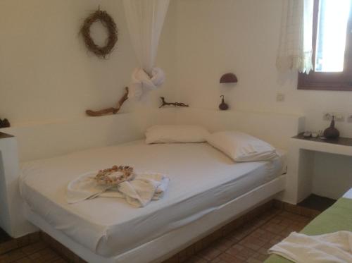 Una cama o camas en una habitación de San Giorgio