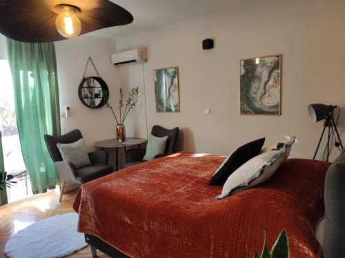 Postel nebo postele na pokoji v ubytování Apartments Nora
