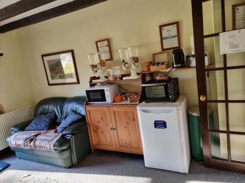 Kuchyň nebo kuchyňský kout v ubytování B&B Drum Farm