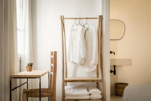 Кровать или кровати в номере Meloussa Boutique Hotel