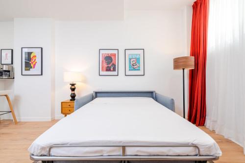Voodi või voodid majutusasutuse Francisco Remiro Fabulous Furnished Apartments in Guindalera toas