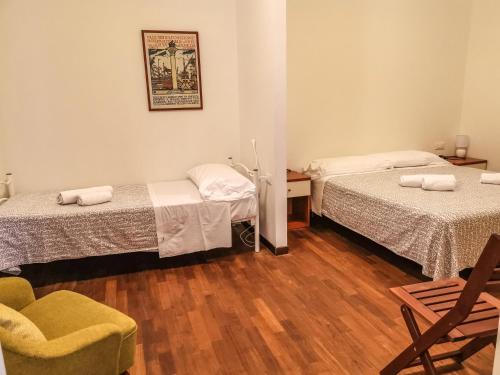 Säng eller sängar i ett rum på Dorsoduro Venice Apartment