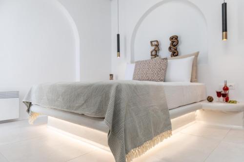 Ένα ή περισσότερα κρεβάτια σε δωμάτιο στο Naxian Lounge Villas