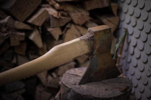an old hammer sitting on top of a piece of wood at Chalet Aargovia in Wengen