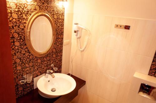Apartamenty Siedem Komnat Siedmiu Mistrzówにあるバスルーム