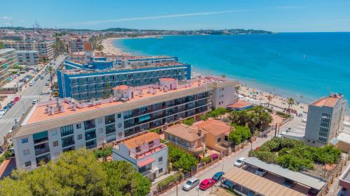 an aerial view of a city and the beach at Apartamentos Turísticos Augustus in Cambrils