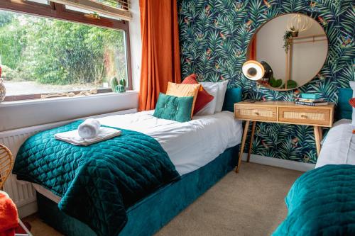 Katil atau katil-katil dalam bilik di Kelswick Lodge