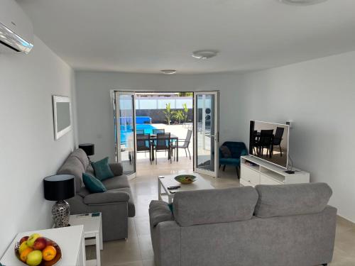 Villa Ashdene - luxury modern villa with large heated pool wifi uk tv bar & BBQ