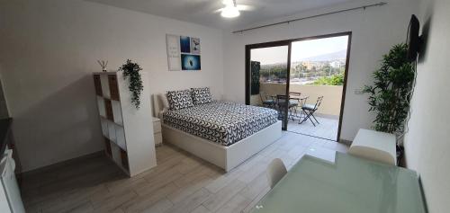 Posteľ alebo postele v izbe v ubytovaní Mareverde vista mare con tres piscinas