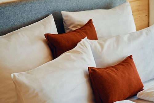 Ένα ή περισσότερα κρεβάτια σε δωμάτιο στο Echt Zeit Apartments