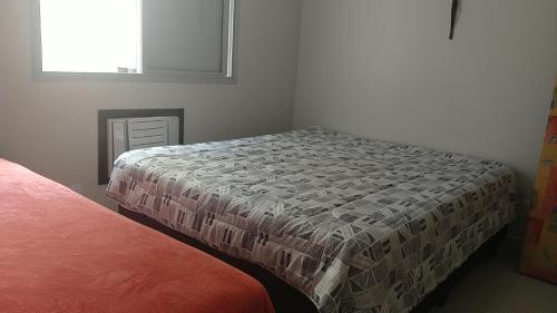 Postel nebo postele na pokoji v ubytování APT em Santos perto de tudo SHOPPING E PRAIA