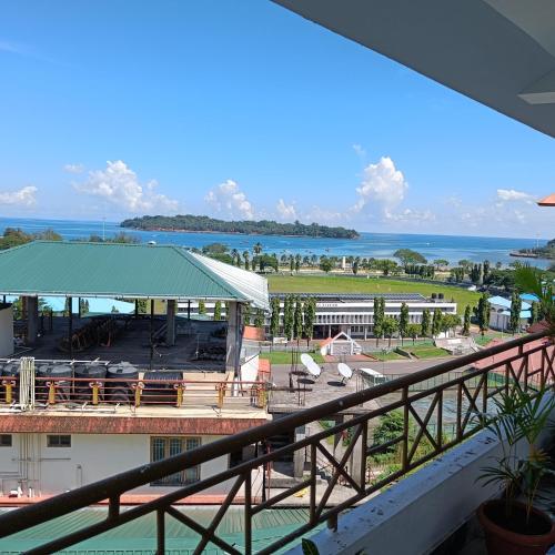 a view of a resort with the ocean in the background at Blue Bridge Homes in Port Blair