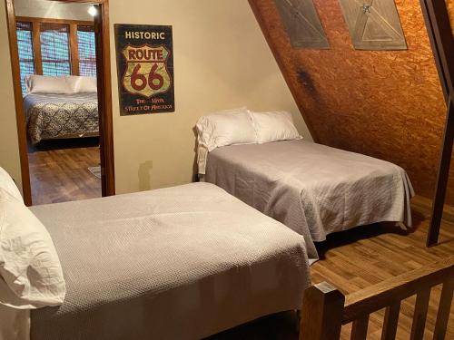 Säng eller sängar i ett rum på The Springs Retreat