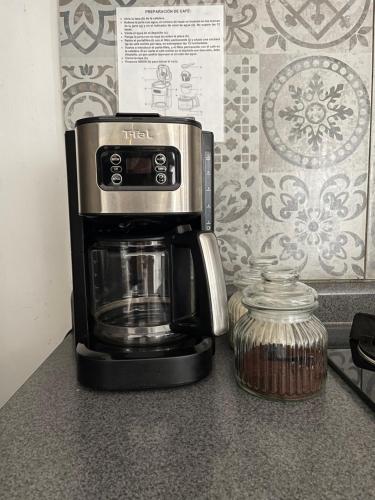 a coffee maker sitting on top of a counter at EXCELENTE ALBERCA PRIVADA EN RESIDENCIAL PRIVADO, GYM, asador in Ciudad Valles