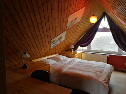 Postel nebo postele na pokoji v ubytování Ferienhaus Ossi