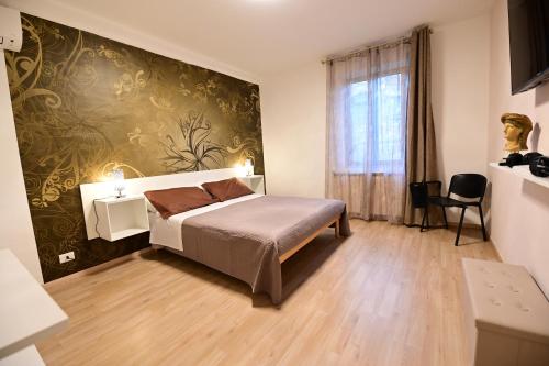 Ein Bett oder Betten in einem Zimmer der Unterkunft La casa di Odessa
