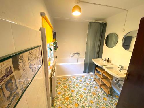 Ein Badezimmer in der Unterkunft See-Chalet Riederau